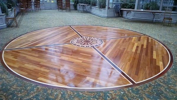 Round wood floor inlay